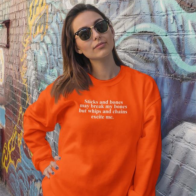 Harry Styles Wearing Sticks And Stones May Break My Bones But Whips And Chains Excite Me T Shirt