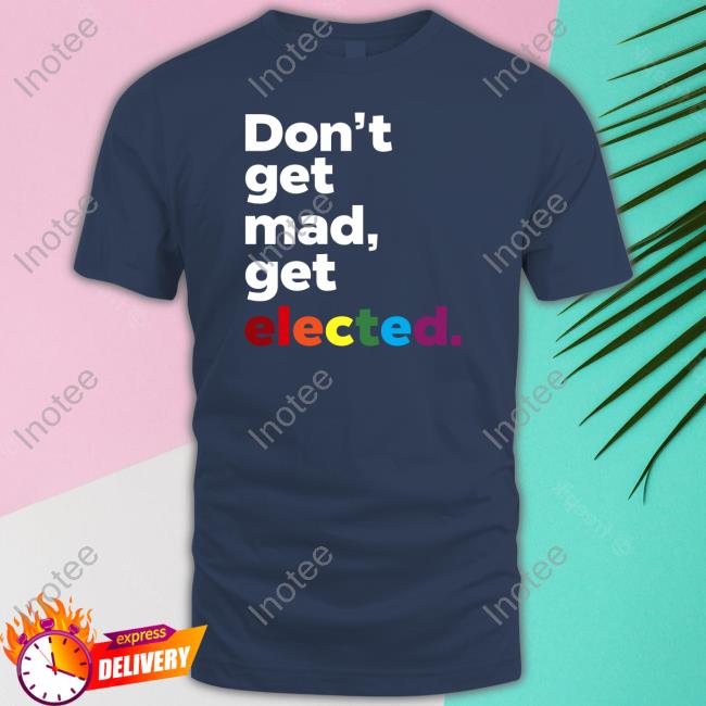 Sam Brinton Wearing Don't Get Mad Get Elected T Shirts